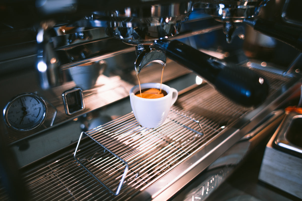 Espresso being poured from a café espresso machine